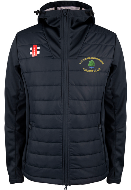 The Bartestree & Lugwardine CC Pro Performance Jacket by Gray Nicolls is a black zip jacket with a quilted front, zip closure, pockets, a green and yellow logo on the left chest, and a small white and red emblem on the right.