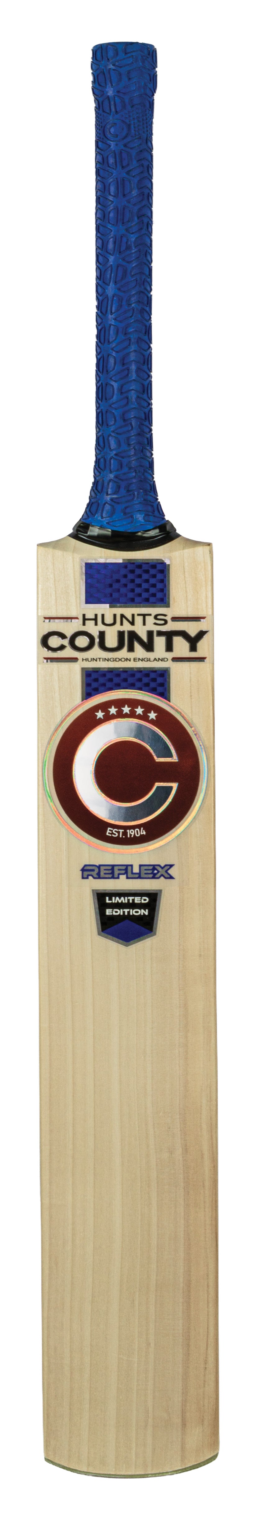 The Hunts County Reflex Limited Edition Junior Cricket Bat features English willow, a blue textured grip, and the Maxum Est. 1904 crescent logo—ideal for budding players seeking quality from the Hunts County brand.