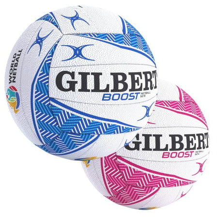 Two white Gilbert Boost Match Netballs, size 5, in blue and pink geometric patterns with the Gilbert branding and World Netball logo—these balls offer classic match ball quality.
