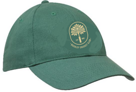 The Bushley CC Green Cricket Cap by Martin Berrill Sports features a gold club logo with a tree, "EST 1922," and "BUSHLEY CRICKET CLUB" on the front. One size fits most.