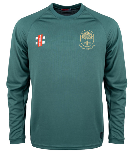 The Gray Nicolls Bushley CC Matrix V2 Long Sleeve T-Shirt in green is ideal for training, featuring a gold "Hornby Cricket Club" chest logo, two white rectangles with a red label on the right, and a buttonless crew neck.