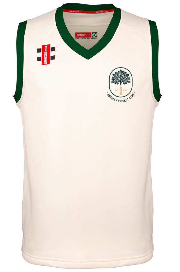 The Gray Nicolls Bushley CC Pro Performance Slipover is a sleeveless white cricket slipover with dark green trim. The left chest bears the club logo, featuring a tree and "BUSHLEY CC," while the right shoulder shows a red sponsor patch.