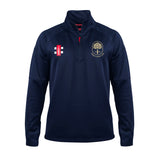 The Gray Nicolls Bushley CC Pro Thermo Fleece is a navy blue long-sleeve 1/4 zip pullover with raglan sleeves, a cricket bat and ball logo on the left chest, and a gold tree emblem with text on the right chest.
