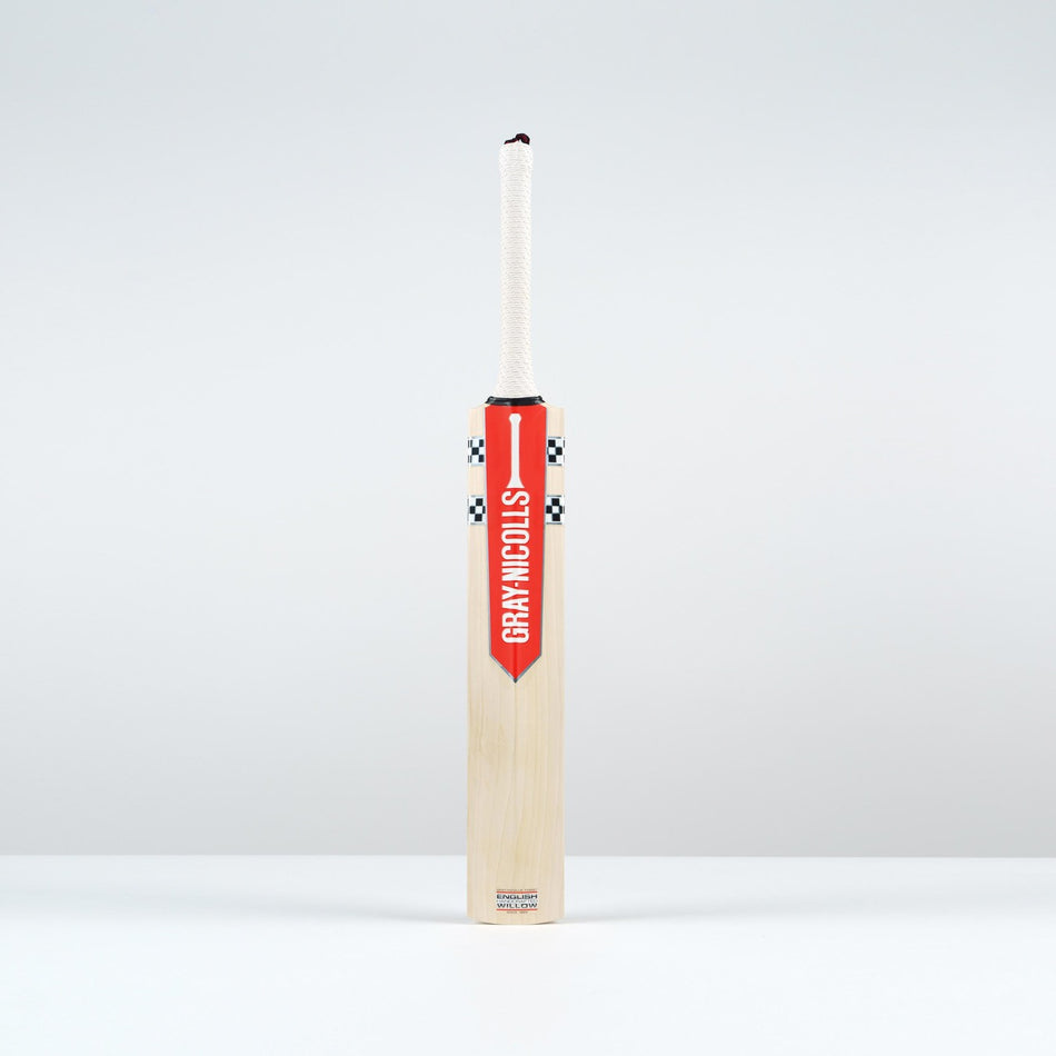 The Gray Nicolls Classic Pro Performance SH Cricket Bat 2026, featuring a large edge profile and the iconic red and white Gray Nicolls label, stands upright on a plain white surface against a light gray background.