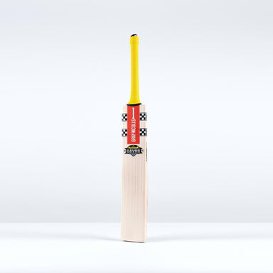 The Gray Nicolls Havoc HB317 Pro Edition SH 2026 cricket bat, with a light mid-blade profile, yellow grip, and striking red and black branding, stands upright against a plain white background.