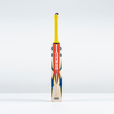 The Gray Nicolls Havoc HB317 Pro Edition SH 2026 cricket bat, featuring a mid-blade profile, yellow grip, and orange-blue accents with Gray Nicolls branding, stands upright against a plain white background.