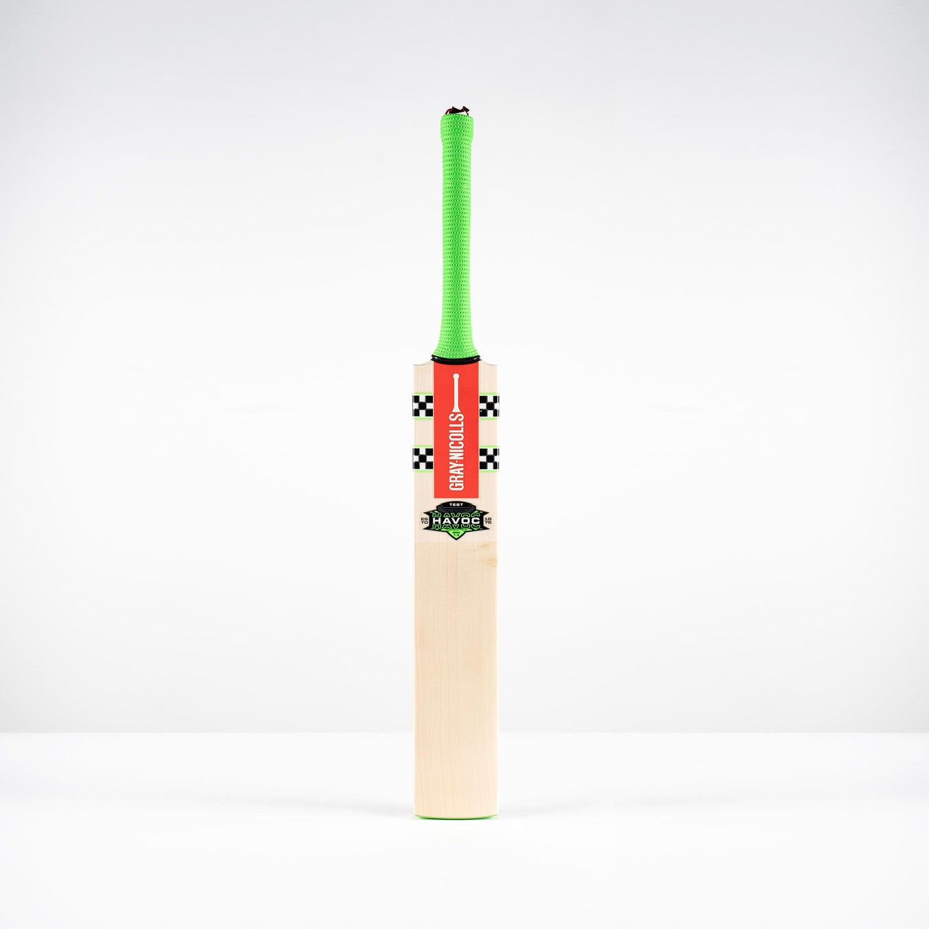 The Gray Nicolls Havoc 1.3 Test SH 2026 cricket bat, featuring a bright green handle, light wooden blade, and branded front stickers, stands upright against a plain white background.