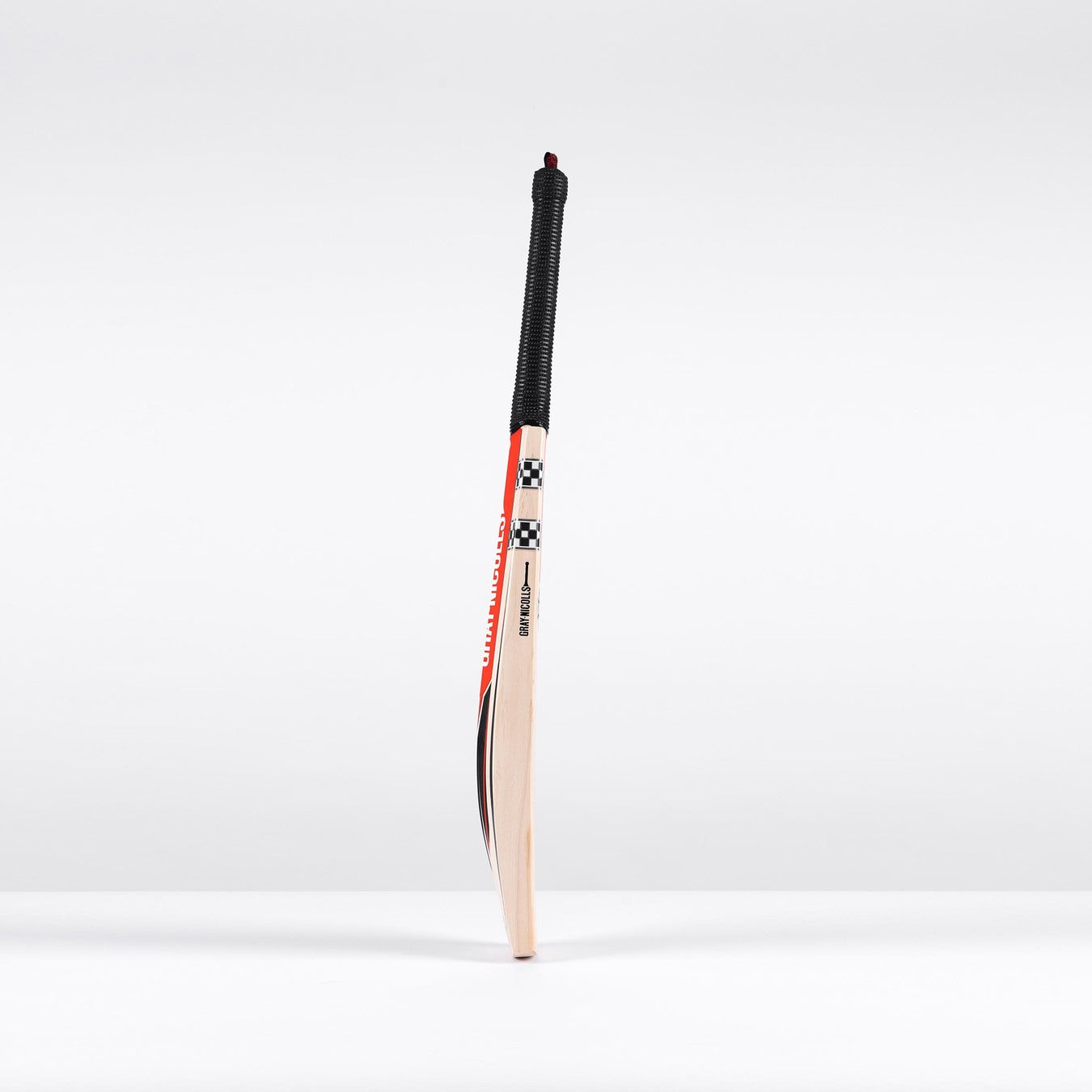A Gray Nicolls Imperia 1.0 Pro V Lite SH 2026 cricket bat with a black grip stands upright on a white surface against a plain white background.