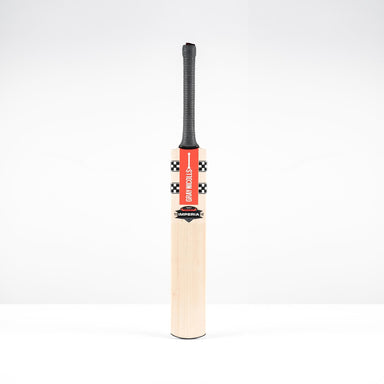 The Gray Nicolls Imperia 1.0 Test Cricket Bat 2026 features a black grip and red checkered label, standing upright against a plain white background.