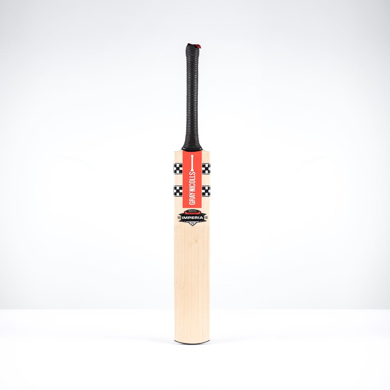 The Gray Nicolls Imperia 1.0 GN550 SH 2026 cricket bat stands upright against a white background, featuring a black grip and checked red and white Gray Nicolls branding, with a low sweet spot design.