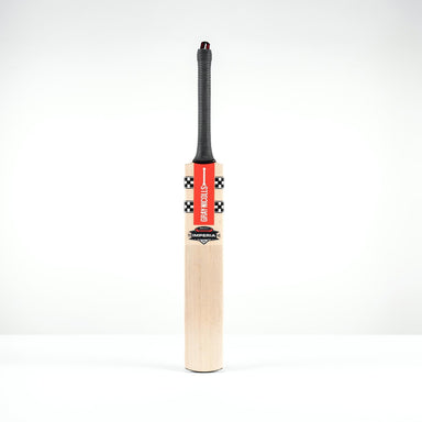 The Gray Nicolls Imperia 1.0 GN350 Junior Cricket Bat 2026, featuring a black handle and red, black, and white decals, stands upright against a plain white background—perfect for young players seeking a low sweet spot.