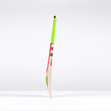 The Gray Nicolls Fusion Pro SH 2026 Cricket Bat features a bright green grip and stands upright on a white surface, highlighting its lightweight design and mid-to-low sweet spot against a plain background.