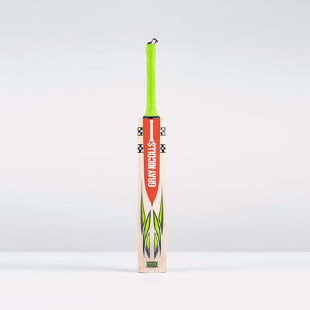 The Gray Nicolls Fusion Pro SH 2026 Cricket Bat stands upright against a plain background, featuring a bright green handle, orange label, green and black flame designs, and a mid-to-low sweet spot for powerful play.