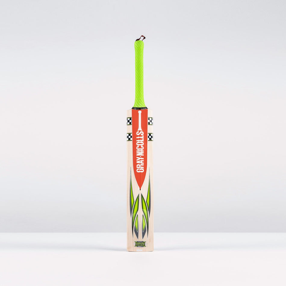 The Gray Nicolls Fusion Pro SH 2026 Cricket Bat stands upright against a plain background, featuring a bright green handle, orange label, green and black flame designs, and a mid-to-low sweet spot for powerful play.