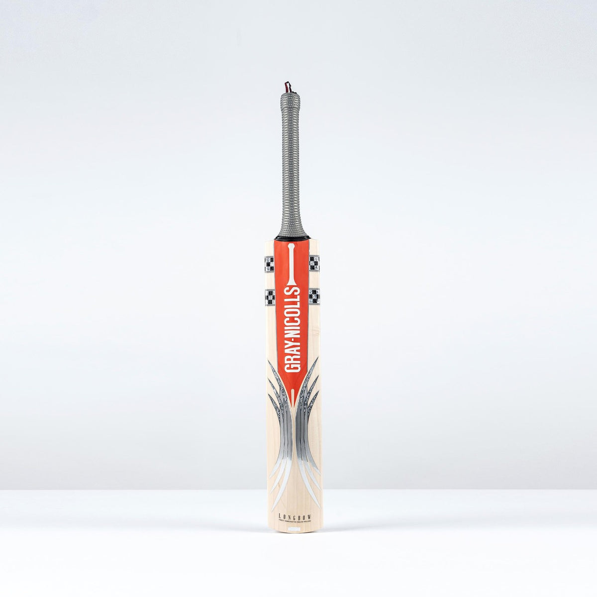 The Gray Nicolls Longbow Pro Junior Cricket Bat 2026 features a mid-to-low sweet spot, gray handle, and bold red branding, standing upright against a plain white background.