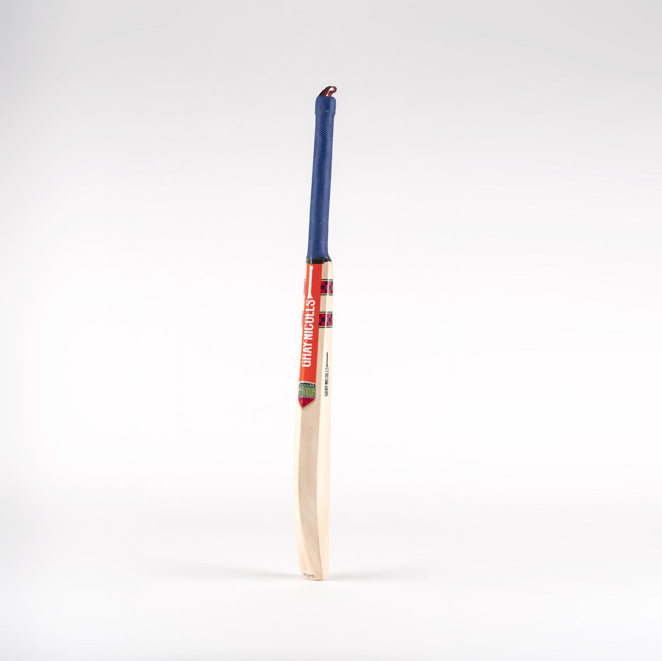 The Gray Nicolls Slimline Technique Cricket Bat, featuring a blue grip, red and white label, and light wooden blade, is shown upright against a plain white background.