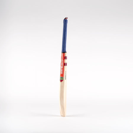 The Gray Nicolls Slimline Technique Cricket Bat, featuring a blue grip, red and white label, and light wooden blade, is shown upright against a plain white background.