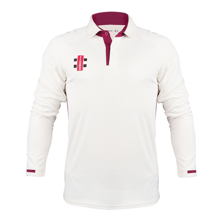The Gray Nicolls Penallt & Redbrook CC Pro Performance V3 Long Sleeve Match Shirt features white fabric with maroon accents on the collar, placket, and cuffs, a red and black left-chest logo, and anti-bacterial sportswear technology for comfort.