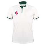 The Gray Nicolls Pro Performance V3 Short Sleeve Shirt features a white design with dark green collar and sleeve trim, three buttons, and a red and black logo on the chest. This moisture-wicking shirt is ideal for cricket players wanting comfort and style.