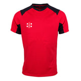 The Gray Nicolls Pro T20 Short Sleeve Match Shirt features a red and black design with geometric patterns, a small white logo on the chest, and offers anti-UV protection—ideal high-performance cricket wear from Gray Nicolls.
