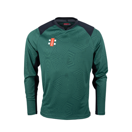 The Gray Nicolls Pro T20 Long Sleeve Match Shirt by Gray Nicolls features green/black colors, black shoulder panels, geometric patterns, and a red and white logo on the left chest, shown on a plain white background.