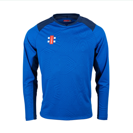 The Gray Nicolls Pro T20 Match Shirts 12 Pack with Logo features long blue sleeves, dark blue shoulder panels, a geometric pattern, and a small red and white club logo on the left chest. Shown on a plain white background.