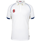 The Gray Nicolls Redmarley CC Junior Short Sleeve Matrix V2 Shirt (Larger Sizes) is a white athletic fit cricket shirt with navy trim, a buttoned placket, moisture-wicking fabric, and features a red and black logo on the left chest.
