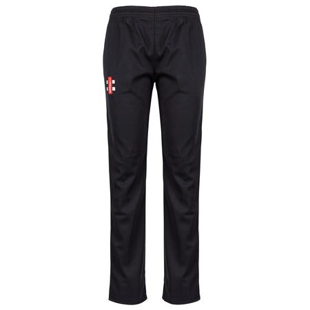 The Gray Nicolls Bushley CC Matrix V2 Ladies T20 Trousers in black feature a relaxed fit, elastic waistband, and a small red and white logo on the upper left thigh. These polyester sports trousers are shown against a plain white background.