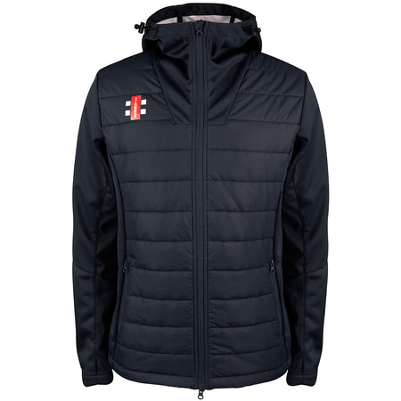 The Gray Nicolls Cam CC Pro Performance Jacket is a black, slim-fit, quilted jacket with a hood, front zipper, two zippered side pockets, horizontal stitching, water-repellent fabric, and a small red-white-black logo on the left chest.