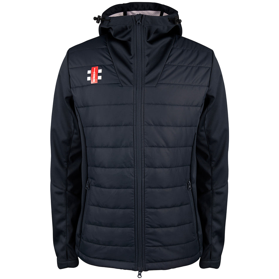 The Gray Nicolls Cam CC Pro Performance Jacket is a black, slim-fit, quilted jacket with a hood, front zipper, two zippered side pockets, horizontal stitching, water-repellent fabric, and a small red-white-black logo on the left chest.