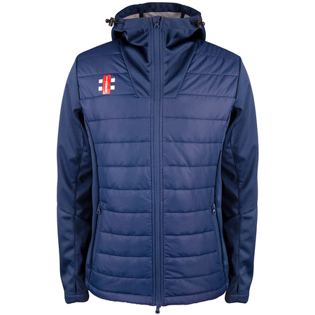 The Gray Nicolls Stanway CC Pro Performance Full Zip Jacket is navy blue, made of recycled polyester, with a hood, front zipper, side pockets, quilted water-repellent design, and a red and white rectangular logo on the left chest.