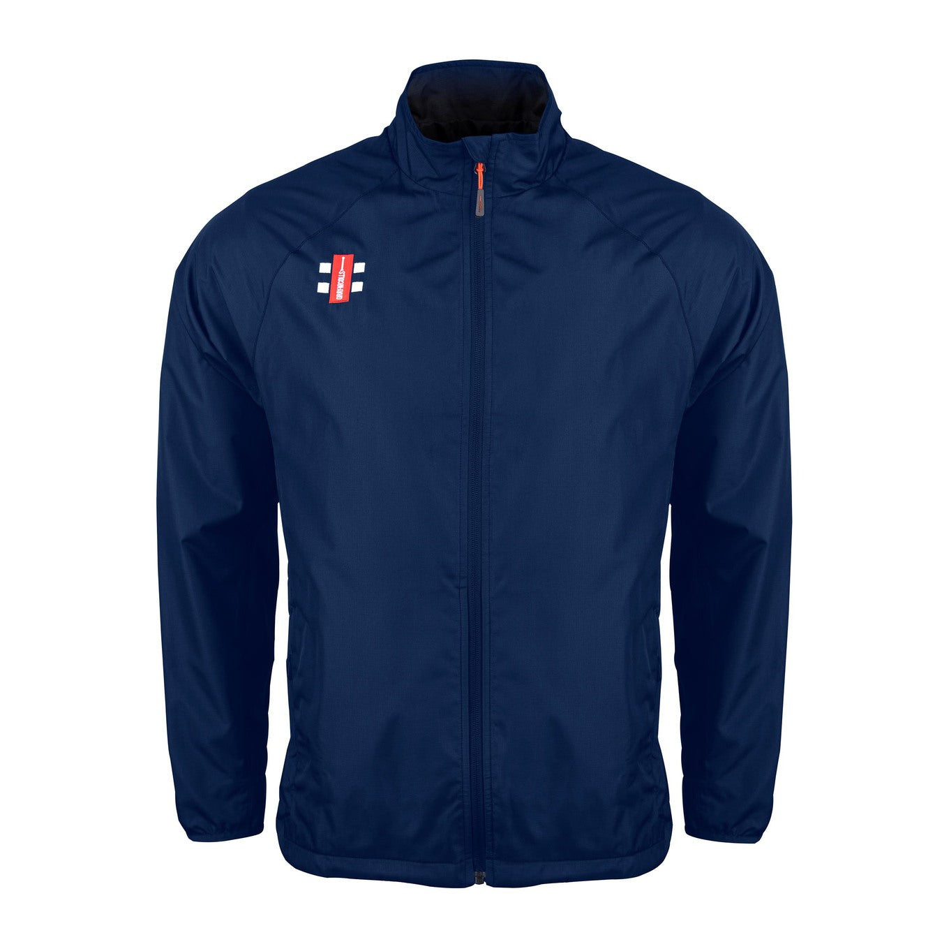 The Gray Nicolls Bushley CC Velocity Rain Jacket is a navy blue, lightweight training jacket with a high collar, long sleeves, water-repellent finish, athletic design, and a small red and white rectangular logo on the left chest.