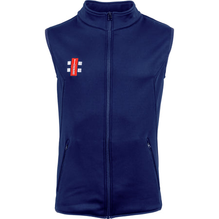 The Gray Nicolls Storm Thermo Bodywarmer is a navy blue sleeveless zip-up vest with a high collar, two zippered pockets, and a small red and white rectangular logo—ideal as a mid layer fleece or stylish fleece gilet.