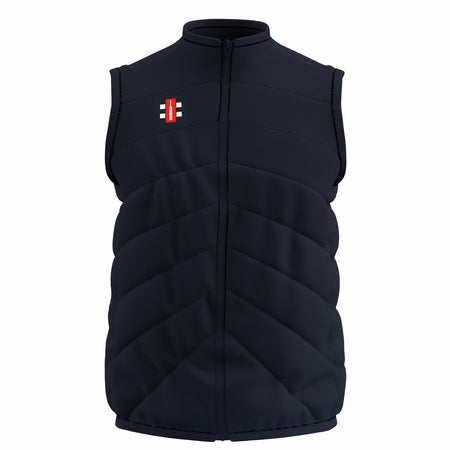 The Gray Nicolls Old Down CC GTS Body Warmer is a dark navy, sleeveless cricket vest with a front zipper, high collar, horizontal quilted stitching, and a small red, white, and black rectangular logo on the left chest. Lightweight comfort.