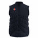 The Gray Nicolls Old Down CC GTS Body Warmer is a dark navy, sleeveless cricket vest with a front zipper, high collar, horizontal quilted stitching, and a small red, white, and black rectangular logo on the left chest. Lightweight comfort.