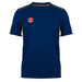 The Gray Nicolls Arcadians Nine Elms CC Pro Performance T-Shirt is a lightweight, breathable athletic shirt in dark blue with black shoulder and side accents plus a small vertical red and white logo on the left chest for workout comfort.