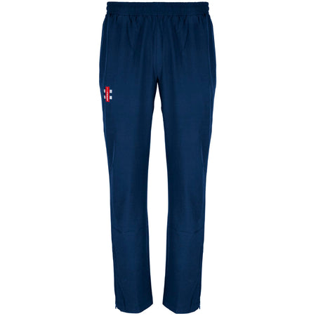 The Gray Nicolls Winchcombe CC Velocity Track Trousers are navy blue with an athletic fit, elastic waistband, and a small red and white logo on the left thigh, perfect for cricket training, shown on a white background.