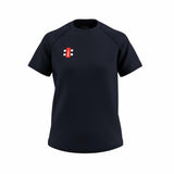 The Gray Nicolls GTS Womens S/S Tee Shirt is a dark navy performance t-shirt with a small red and white rectangular logo on the left chest, crafted from moisture-wicking technical fabric and shown on a white background.