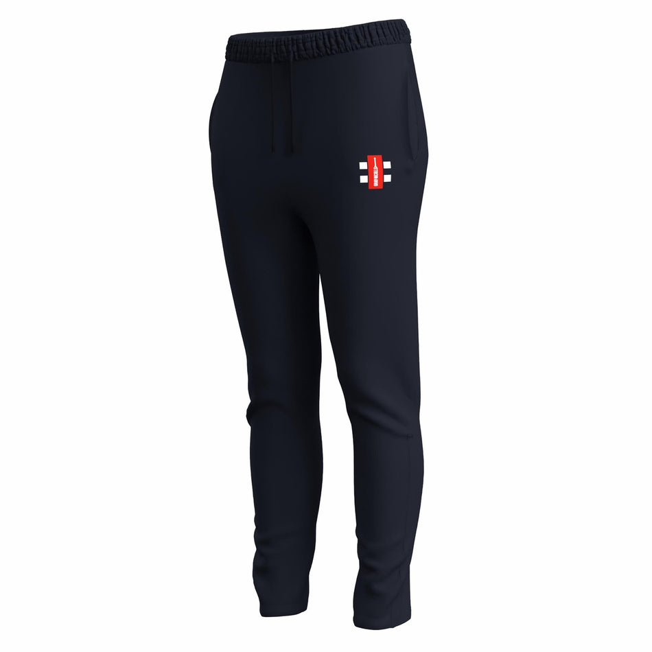Gray Nicolls GTS Womens Training Trousers in dark navy, featuring a slim fit, elastic waistband with drawstring, performance stretch fabric, and a small rectangular red and white logo with black details on the upper left thigh.