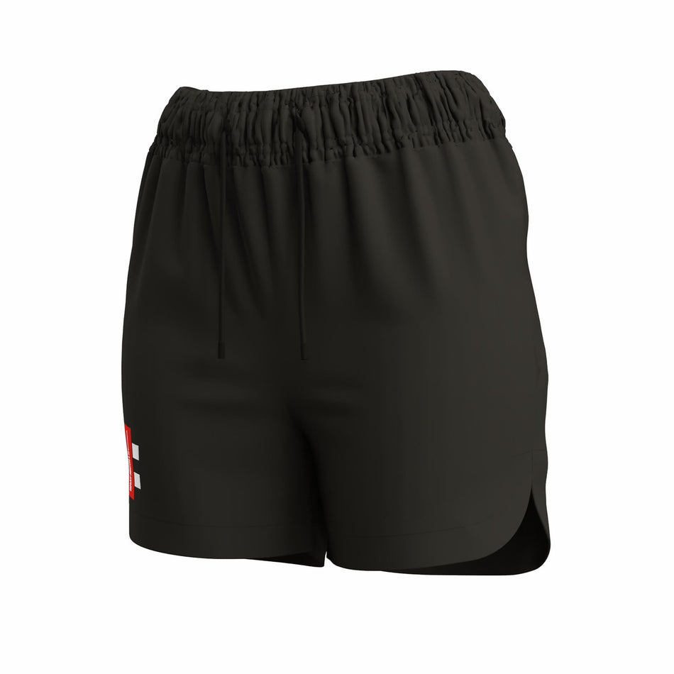 The Gray Nicolls GTS Womens Shorts by Gray Nicolls are black performance shorts with an elasticated waistband, drawstring, and a small red and white geometric design on the lower left leg. Lightweight with a slight side slit. Displayed on a white background.