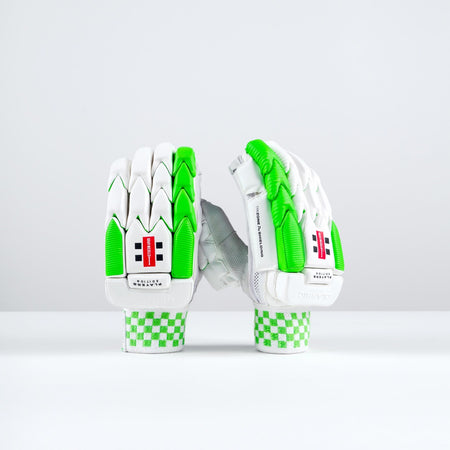 The Gray Nicolls Classic Players Edition Batting Gloves 2026 in green, featuring premium protection and stylish design, stand upright on a white surface against a plain light gray background.