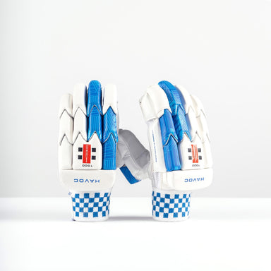 The Gray Nicolls Havoc 1.0 1000 Batting Gloves 2026 feature high-density foam padding, padded knuckles, red and black accents, and checkered blue-and-white wristbands, shown upright against a plain white background.