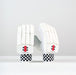 The Gray Nicolls Classic Academy Batting Gloves 2026, with a leather palm, black and white checkered cuffs, and red, black, and white branding on the wrists, are displayed upright against a plain white background.
