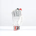 The Gray Nicolls Imperia 1200 Batting Gloves 2026 stand upright with extended fingers, featuring white, gray, black, and red accents plus a red and black checkered wrist strap. Ideal for international players. Plain white background.