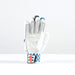 The Gray Nicolls GN200X Batting Gloves 2026, by Gray Nicolls, are white with black and blue accents, gray finger details, perforations for breathability, and a blue-and-white checkered strap with a red-and-black label near the wrist.