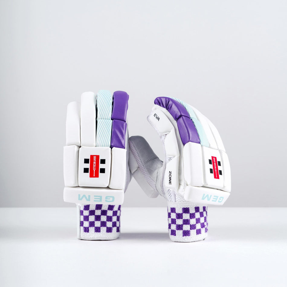 The Gray Nicolls GEM 2.1 400 Batting Gloves 2026 are white with purple and light blue accents, checkered purple cuffs, and red/black branding—ideal for female cricketers, shown upright against a plain white background.