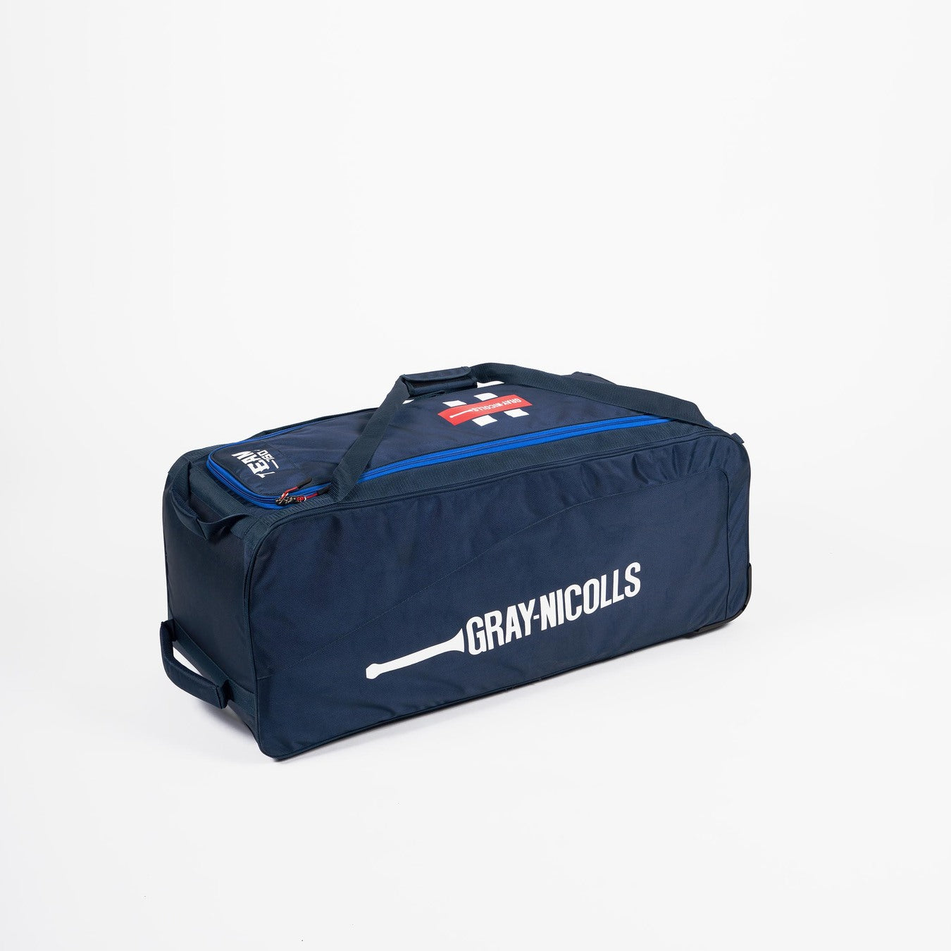 The Gray Nicolls Team 750 Wheelie 2026 is a large navy blue cricket kit bag with bat logo, side handles, zippered main compartment, and red-white label—ideal elite matchday gear—shown on a plain white background.