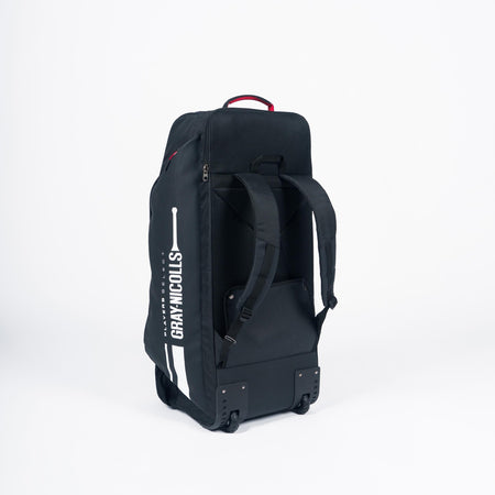 The Gray Nicolls Select Wheelie/Duffle 2026, a spacious black bag with backpack straps and wheels, displays the Gray Nicolls logo and cricket bat graphic on its side as it stands upright against a plain white background.