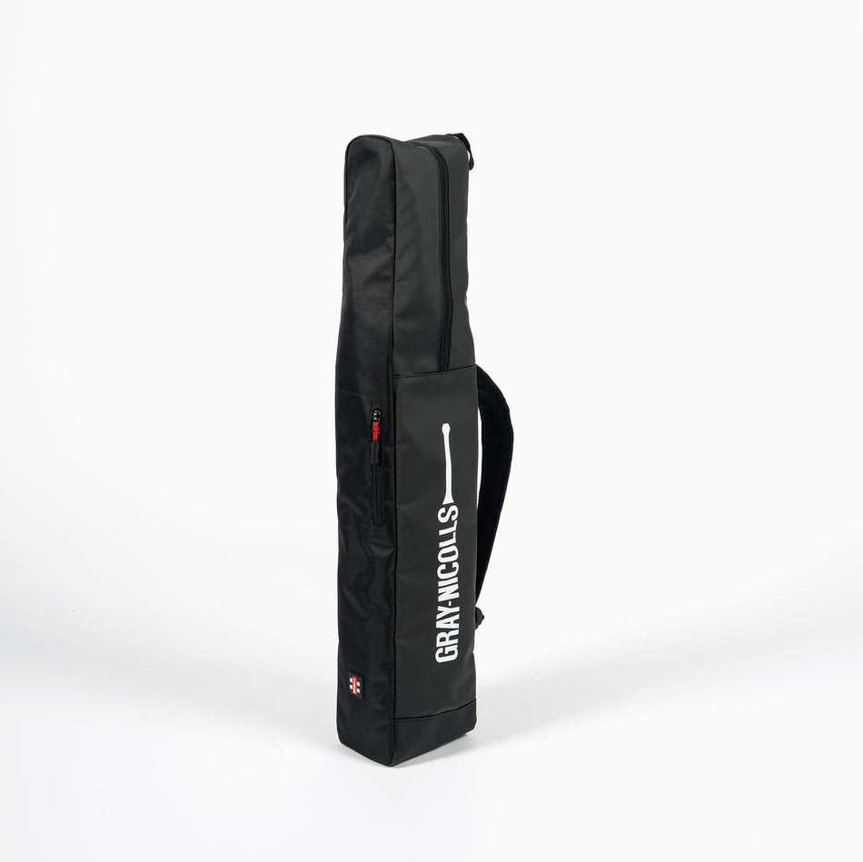 The Gray Nicolls Duo Bat Cover is a black dual bat case with a shoulder strap, featuring the Gray Nicolls logo in white and two cricket stumps graphics on the front. The cover stands upright against a plain white background.