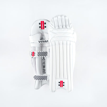 The Gray Nicolls Classic Players Edition Batting Pads 2026 are white leg guards with black and red branding, checkered straps, and lightweight HDF multi-layer protection, shown against a plain white background.